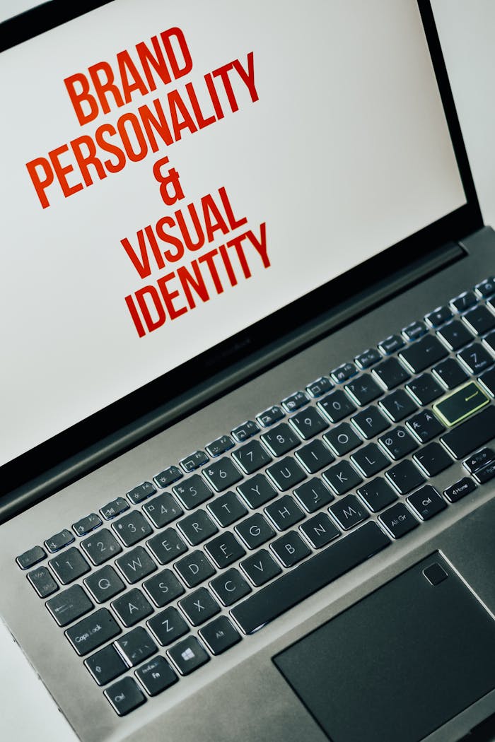services-05 Laptop screen showing text on brand personality and visual identity for marketing strategy.